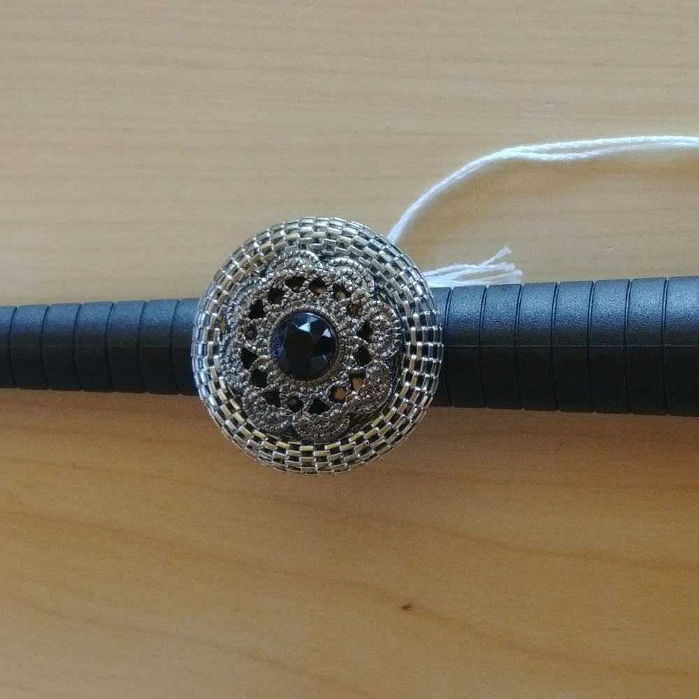 Silver and black ring